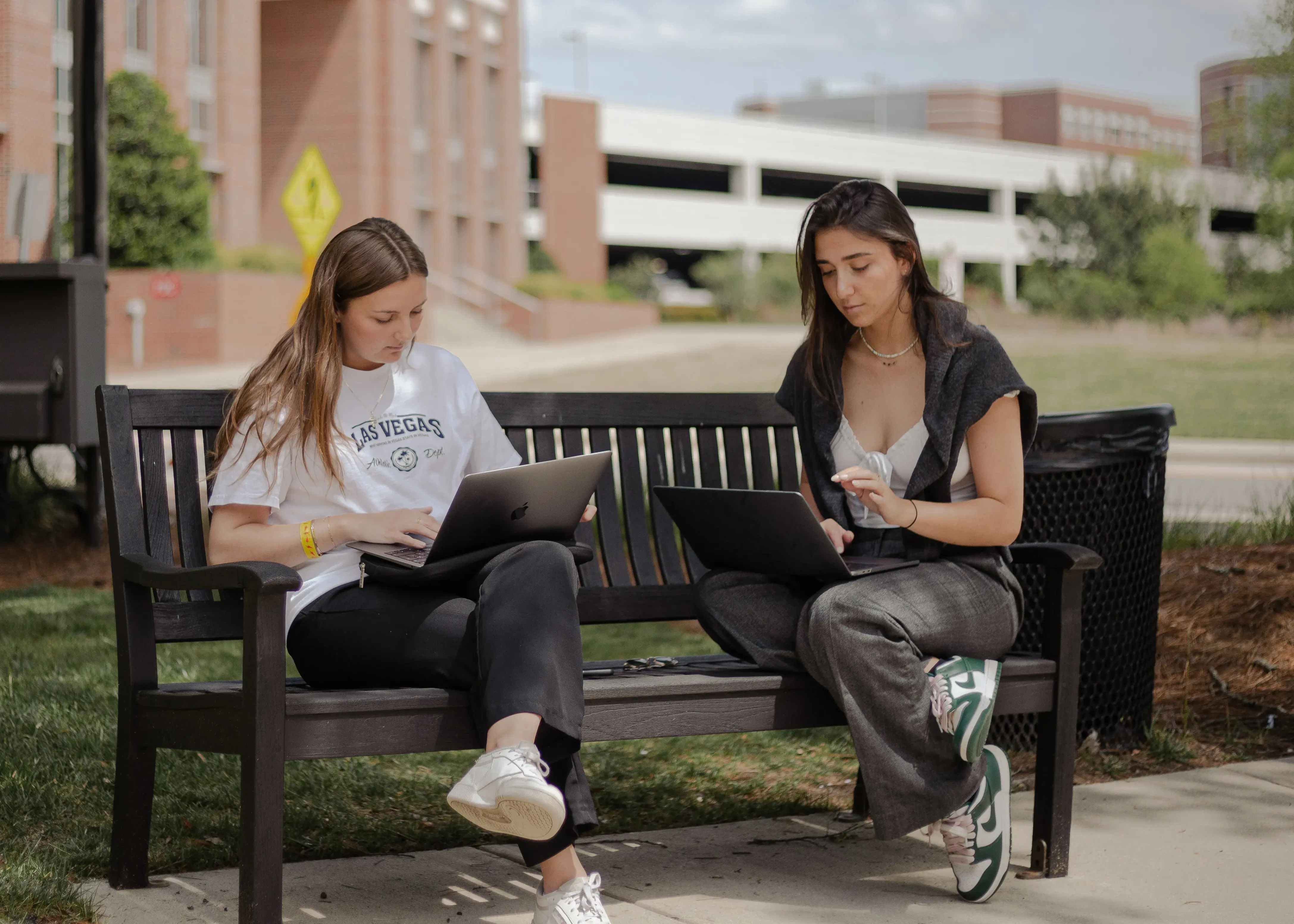 Students on bench in Raleigh